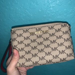 Michael kors Double wristlet- maroon/ cream color
